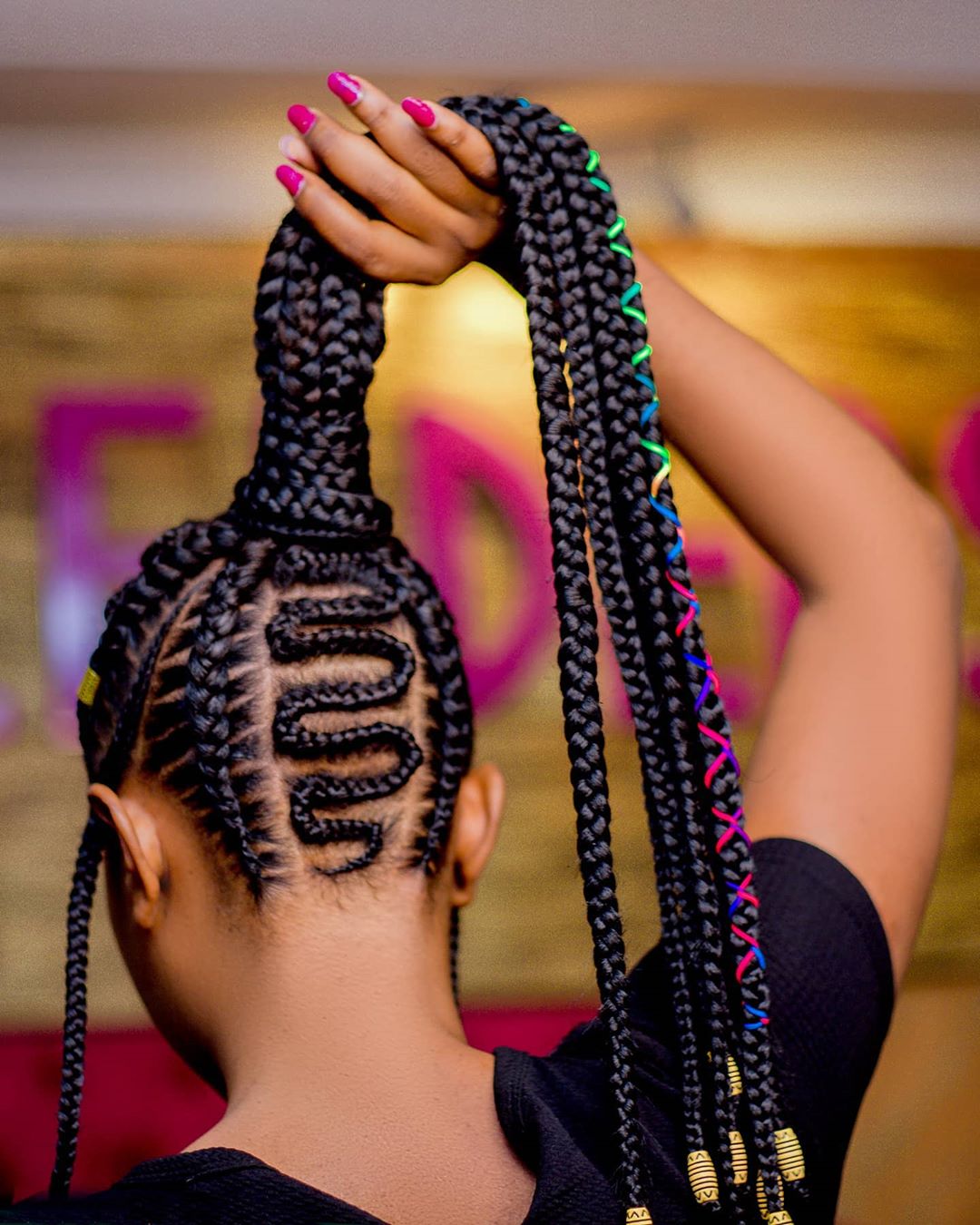feeder braids into a ponytail