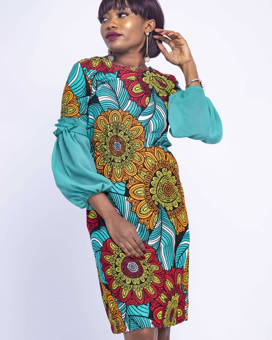 Fashionable, Classy, and Outstanding short Ankara gown 2023